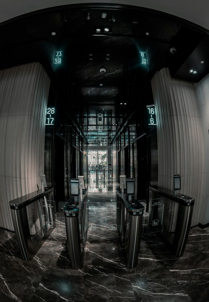 Commercial building lobby with secure speed-gate entry